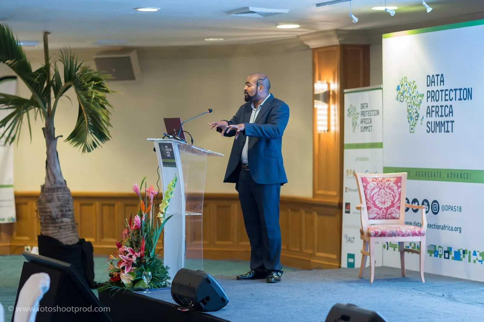 Michael Abtar speaking at a lectern on stage at the Data Protection Africa Summit.